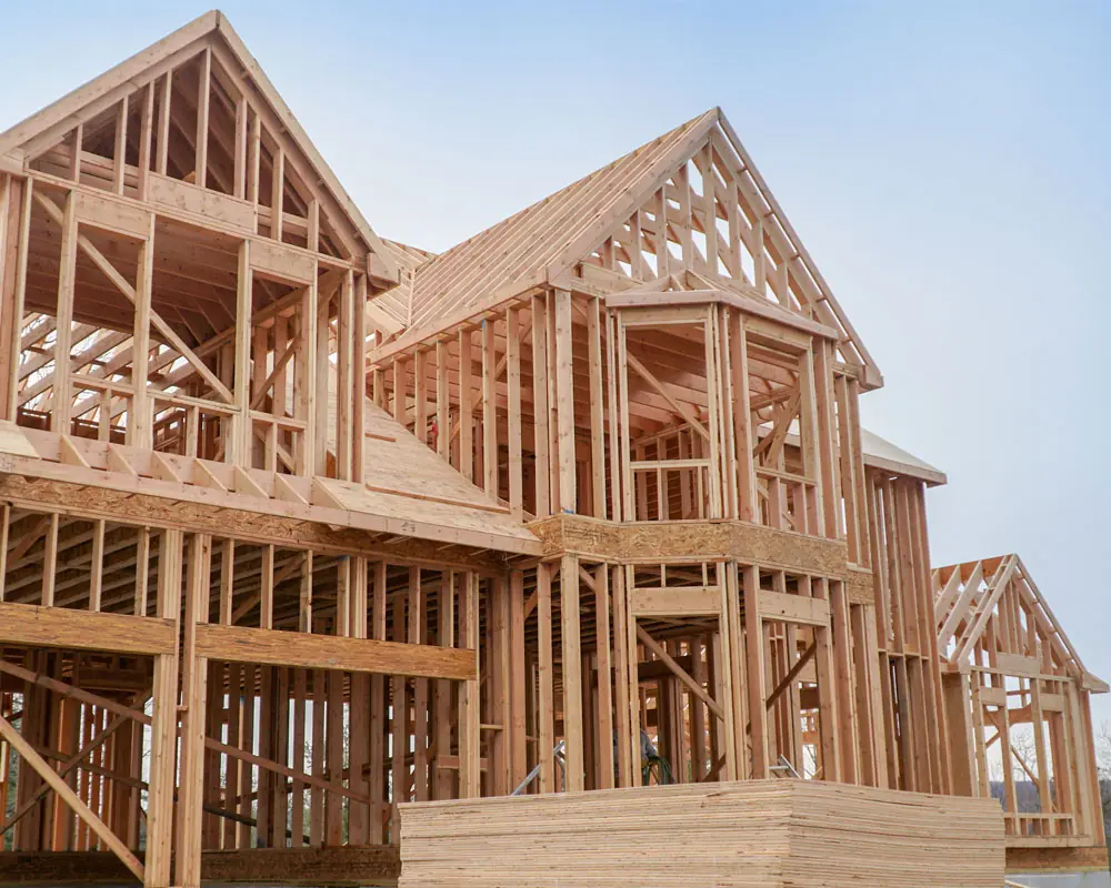 A custom home at framing stage in Morris County